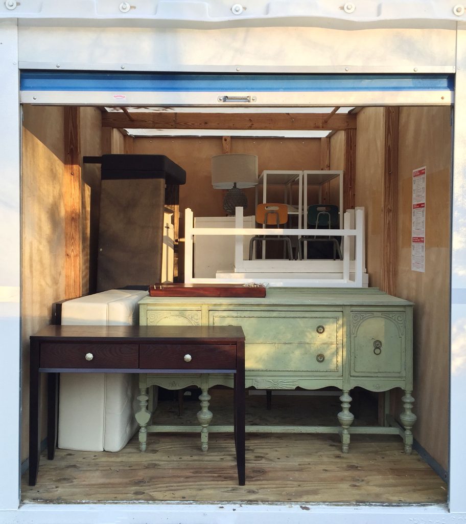 Furniture Stacked In Storage Unit During Floor Refinishing