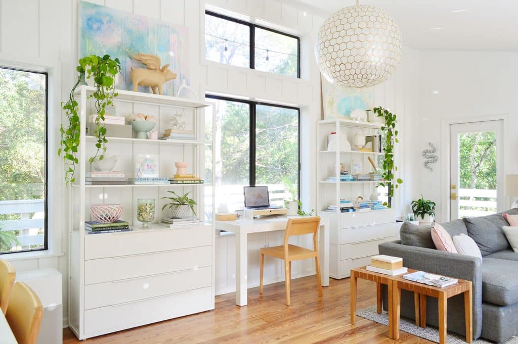 Light filled upstairs family room with Ikea fjalkinge shleves and west elm Parsons desk