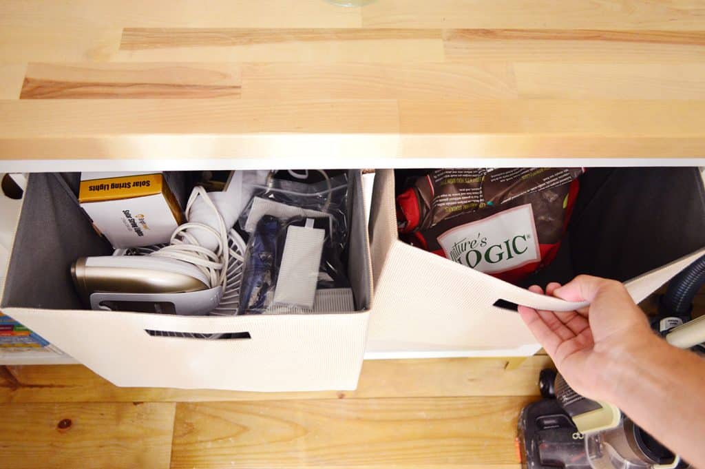 Fabric Bins In Cubby Shelf Pulled Opened With Storage