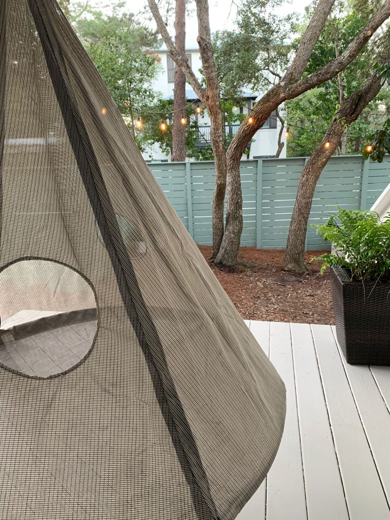 Detail of netted side of hanging porch tent