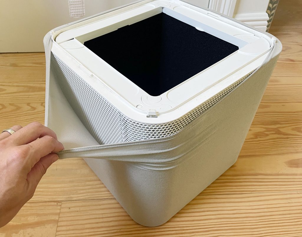 Stretching Blueair Fabric Prefilter Cover Over Air Purifier