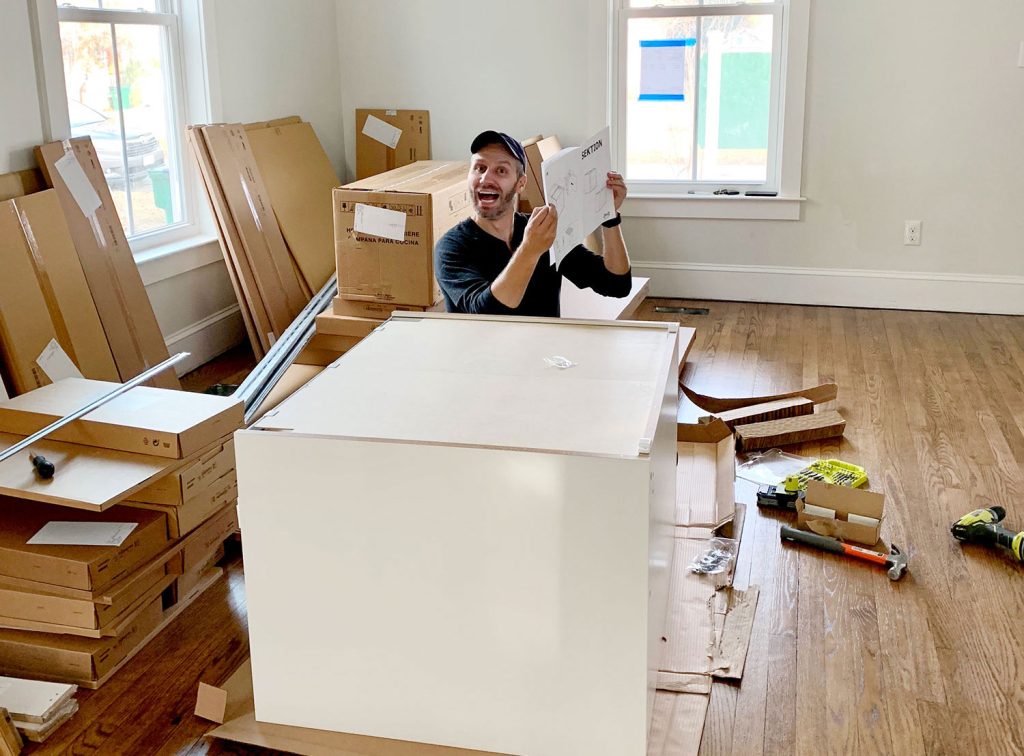 John Looking Stressed While Building Ikea Cabinets